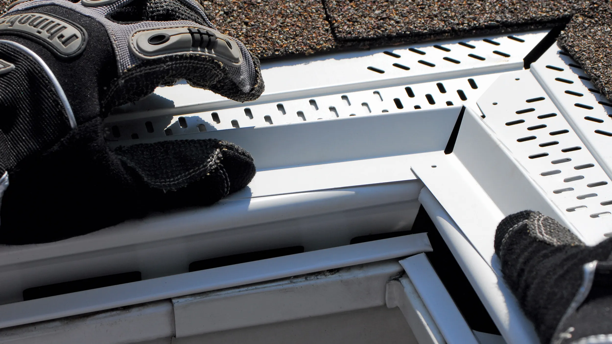 A pre-made inside miter with a built-in splash guard, for the corners.
